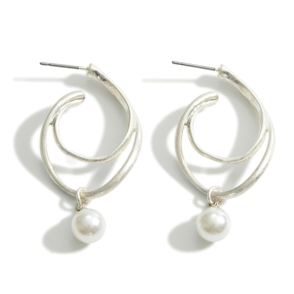 Whimsical Hoop Earrings Featuring a Pearl Accent.