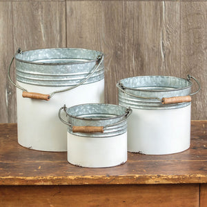 METAL AND WHITE BUCKETS
